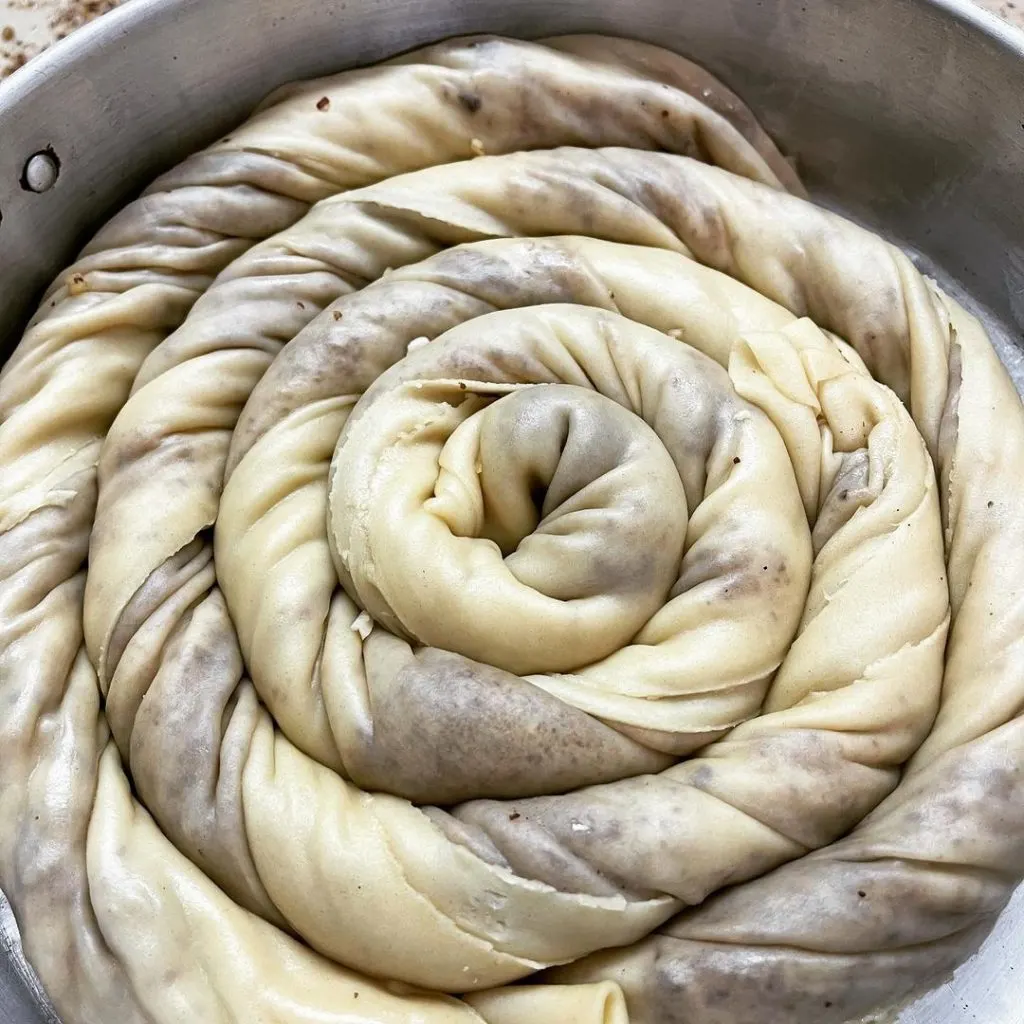 Kattimeri coiled in the tray