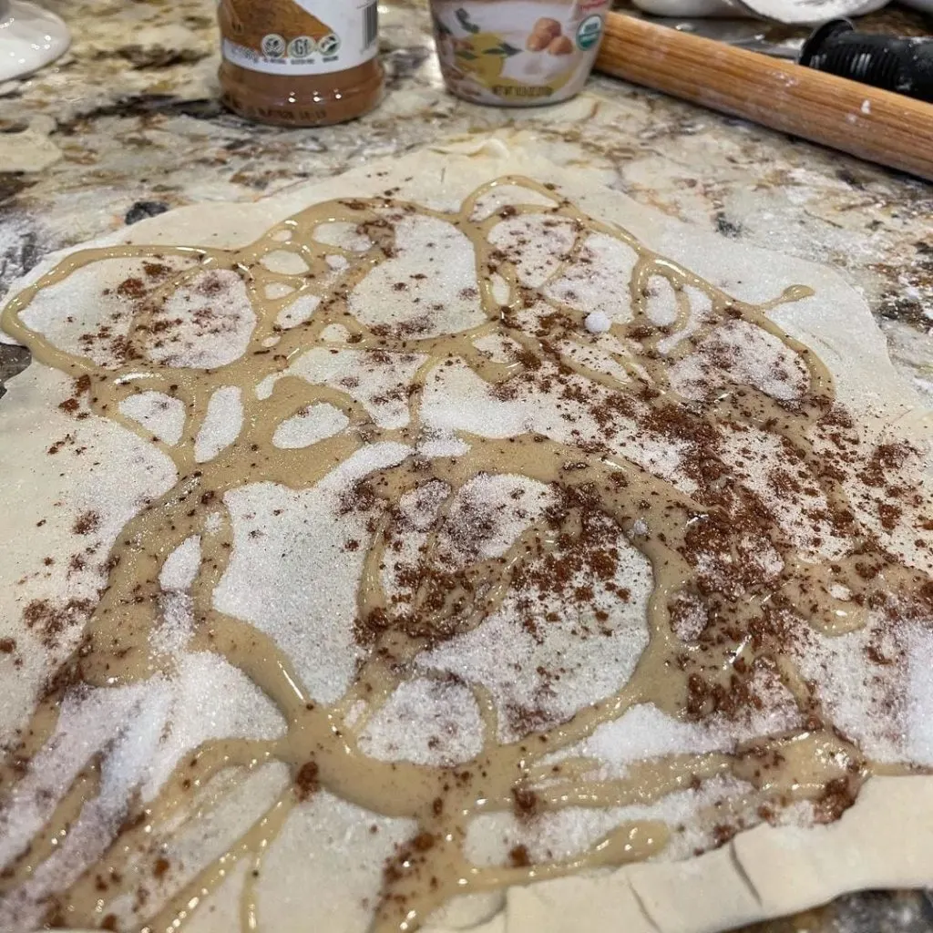 Rolling the tahinopitta dough