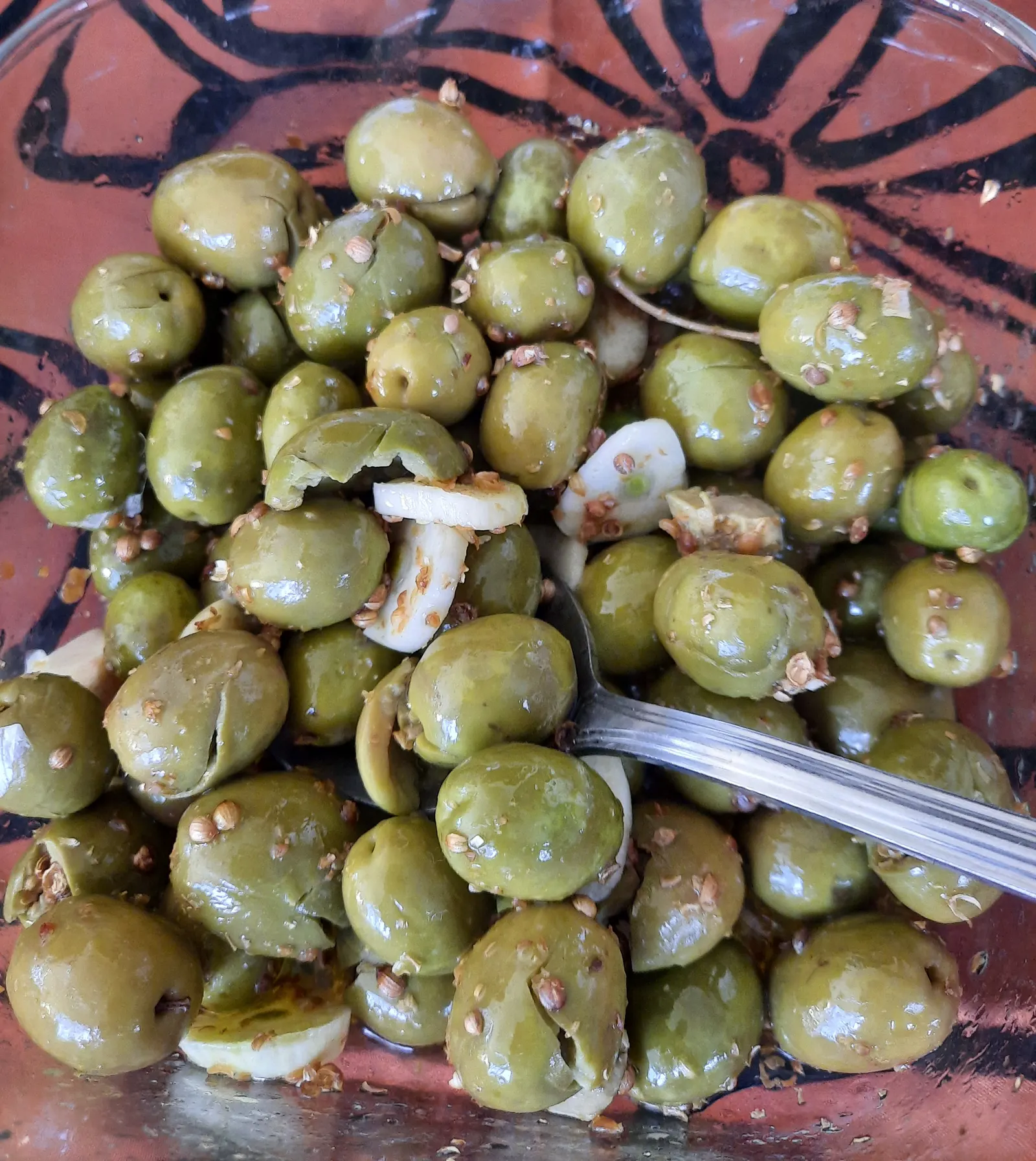 Cracked green olives in brine