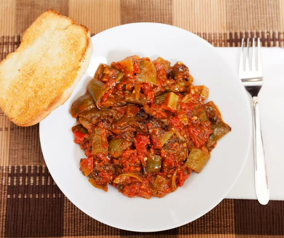 Aubergine simmering in tomato sauce
